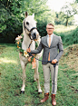 Stylish groom with a horse in a flower garland | Vicki Grafton Photography | see more on: http://burnettsboards.com/2014/03/german-folktale-editorial/