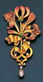 An art nouveau enamel, diamond and pearl pendant, by Plisson et Hartz, circa 1900.