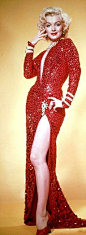 Wearing the dress in the publicity poster for Gentlemen Prefer Blondes, in which Marilyn starred with Jane Russell,