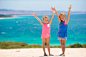 Adorable little girls having fun during beach vacation by Dmitry Travnikov on 500px