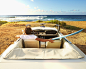 Photograph Caucasian man relaxing in convertible on beach by Gable Denims on 500px