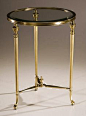 Round antique solid brass occasional table with ribbed urn motif legs