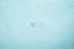 粉彩蓝色木墙纹理背景。