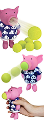 Pig Popper // Just squeeze the pig's belly to launch the soft foam balls. The harder you squeeze, the farther it shoots up to 20 feet. #toy_design