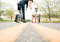 bride and groom on bicycles