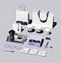 This may contain: an assortment of items are displayed on a gray background, including paper bags and scissors