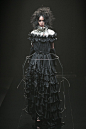 Dark Fashion - ruffled black dress with wire cage skirt; sculptural fashion // Alice Auaa