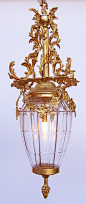 An Ornate French 19/20th Century Gilt-bronze and molded glass "Versailles" style hanging lantern, c. 1900, Paris