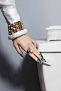 we love the idea of stones around the outside of the nail with deep, jewel tones in the centre as it makes the individual nails look like emeralds.