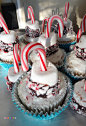 Cupcake topped with marshmallow, chocolate and crushed mint with candy cane.