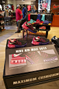 Nike Air Max 2015 retail table display sports shoe display with lit sole and string.