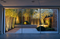 Bamboo, white flowers and a water feature turn this small garden into a showstopper