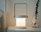 The Accordion Touch Light can alternate between being a lantern and a table-lamp! | Yanko Design