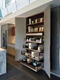 Example of a large trendy galley gray floor kitchen pantry design in Buckinghamshire with flat-panel cabinets and gray cabinets