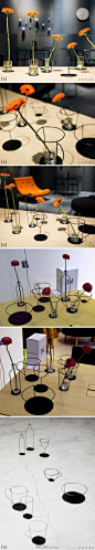 日本的 Nendo工作室为瑞典品牌 David 设计的黑色花瓶，独特的轮廓剪影细黑线条，简约而具有灵气。这一系列是由8个经典餐具元素构成，如：瓶子，咖啡壶、碗、茶杯等。黑丝花瓶能够魔法般的容纳和展示花儿，呈现出纯净自然的美感。