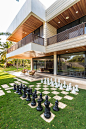 Landscaping Ideas - Liven Up Your Backyard With Some Games // The backyard of this modern home has a built-in chess set.意向图 景观前线 访问www.inla.cn下载高清