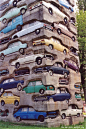 ARMAN  "Long Term Parking", 1982, Dimensions: 1950 cm, Description : Accumulation of 60 automobiles in concrete. 19,5 m. Parc de sculpture Le Montcel, Jouy-en-Josas, France