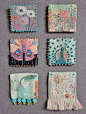Wearable art squares by Geninne.
