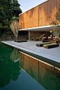 House with bamboo siding and calming reflection pool - Ilhabela, Sao Paulo, Brazil, by Marcio Kogan。微信公众号“一片竹海”，探寻竹的万千形态。