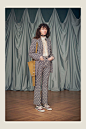 Image may contain Formal Wear Clothing Suit Dress Accessories Bag Handbag Fashion Adult Person Footwear and Shoe