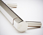 Facet Handle, avail in satin brass or polished nickel, 5.875"w 1.56"d 0.75"dia, $65