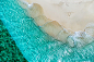 Aerial view of Thudufushi beach in the Maldives captured by Swiss photographer Jennifer Esseiva.