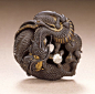 Mitsukiyo (Japan) Dragon Guarding the Jewel of the Buddha, 19th century Netsuke, Iron, gilt, diamond,: 