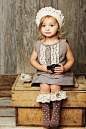 little girl wearing polka dot and lace socks...