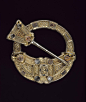 Hunterston Brooch  c.700, Scotland or Ireland  combines Celtic and Anglo-Saxon styles; silver, decorated with amber settings and panels of filigree goldwork; runic inscription on the back reads 'Melbrigda owns this brooch'.