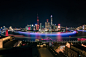 上海外滩黄浦江陆家嘴建筑群夜景船轨全景摄影照片