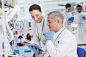 Scientists using tablet computer in laboratory by Caia Images on 500px