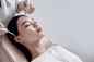 zhc1017787023_Asian_woman_reclining_on_a_leather_recliner_in_ae_b3134ff3-69a2-4cb1-99f0-3c97f47a38c9