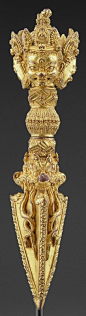 Ritual Dagger (Phurba) to slay demons Date: 1403-1424 Medium: Gilt Bronze Creation Place: Tibet