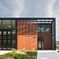 Miller Hull clads Washington fire station in red cedar and black metal : The Miller Hull Partnership has completed a firehouse in the Pacific Northwest with large bi-fold glass doors that enable a quick exit for emergency trucks.