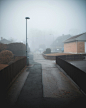 Free Houses Near An Empty Road On A Foggy Day Stock Photo