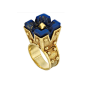 Lot 404
Gold and Carved Lapis Dome Ring, Cartier