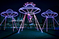 light-emitting retro swings by ENESS invite us to ponder the big questions of life