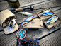 This may contain: fishing gear is laid out on a picnic table