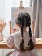 relife_fd_A_twelve_year_old_Chinese_little_girl_sits_at_a_table_97ee253e-483e-4cb4-a1bd-212496cf360d