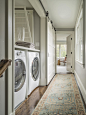 Example of a small country single-wall laundry closet design in Boston with shaker cabinets, white cabinets, wood countertops and gray walls