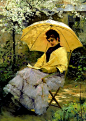 Woman reading under a yellow umbrella: 