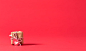 Present box on a red background