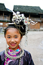 Chinese girl in Miao minority costume.