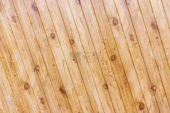 棕色木材纹理背景来自天然树木。木制面板与美丽的图案硬木地板。为文本留出空间。