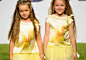 柠檬黄是本季童装黄色系的主流色彩，无论男童装女童装，无论休闲装正装，无处不在的柠檬黄强调了黄色在童装中的重要地位。