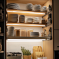 walterssaucedo_A_photo_of_the_inside_of_an_open_kitchen_cabinet_62ca248e-9837-452f-921d-e973ef62cb1b