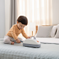mca5259_Mite_removal_instrument_on_the_baby_bed_1-year-old_Asia_a