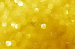 闪烁的灯光闪耀黄色金色华丽的散焦抽象背景闪亮。