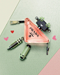 Photo by Prada Beauty on May 11, 2023. May be an image of fragrance, perfume, battery, stapler, pencil case and text.