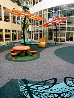 Rainbow Babies &amp; Children's Hospital - Cleveland, OH    The Rainbow Babies Healing Garden is a whimsical themed outdoor (courtyard) environment for children and families to come and relax.     The garden features a brownstone house puppet theatre, a c